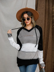 Pull à capuche à blocs de couleurs et œillets