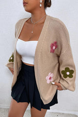 Cardigan ouvert sur le devant à épaules tombantes et appliqués floraux