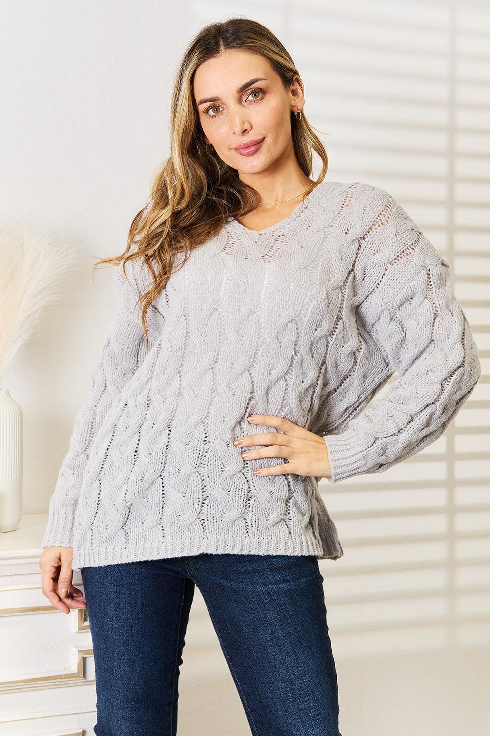Pull à capuche en maille torsadée tissée à droite