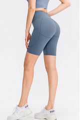 Short de sport à taille large avec poches