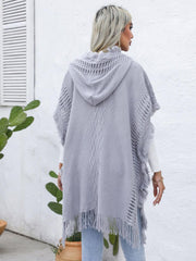 Poncho à capuche boutonné avec bordure à franges