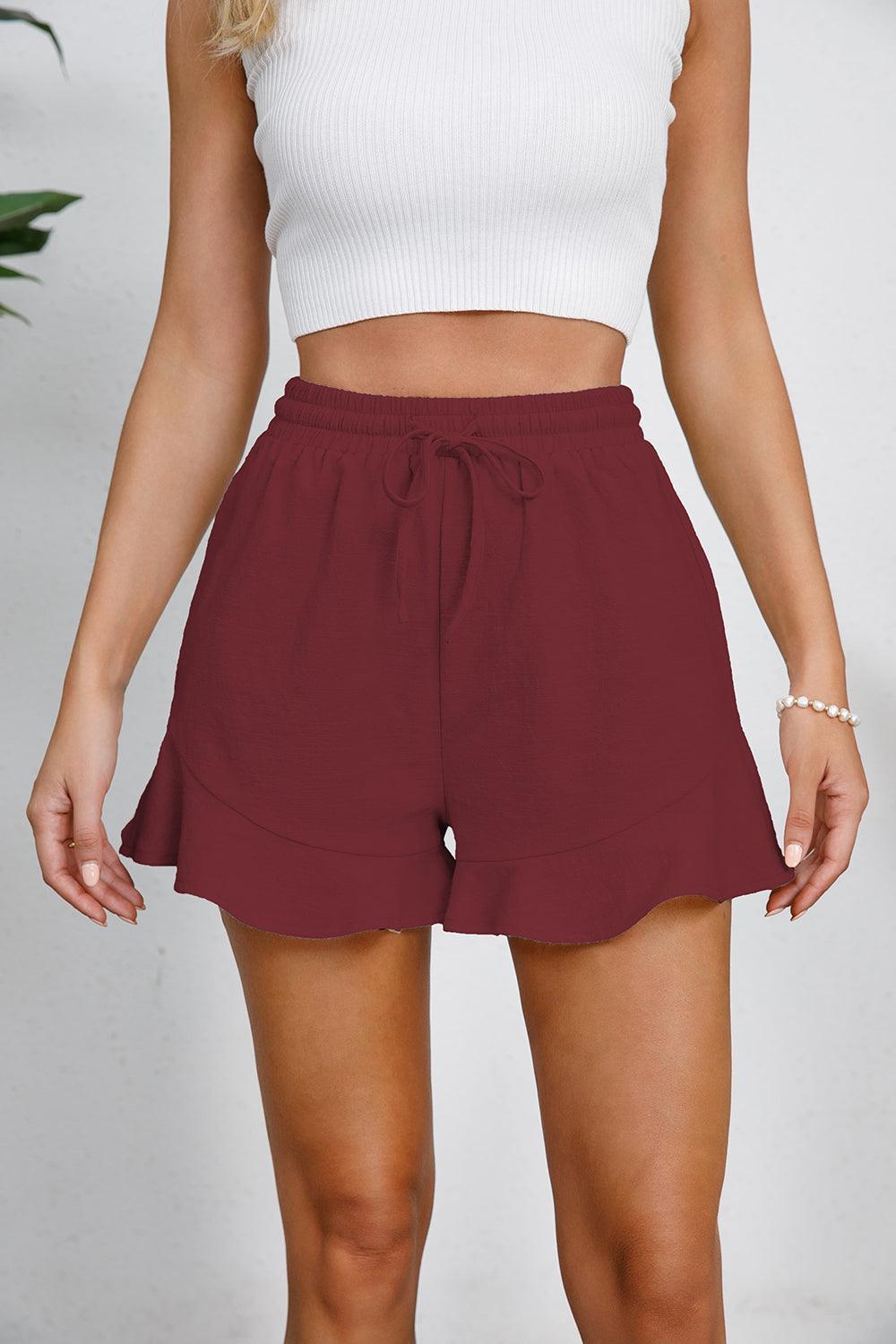 Short taille haute avec ourlet à volants et cordon de serrage