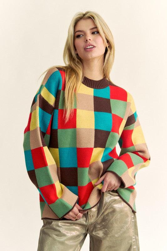 Pull à épaules tombantes à carreaux et blocs de couleurs Davi &amp; Dani