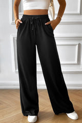 Pantalon à jambe large avec cordon de serrage et poches