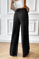Pantalon à jambe large avec cordon de serrage et poches