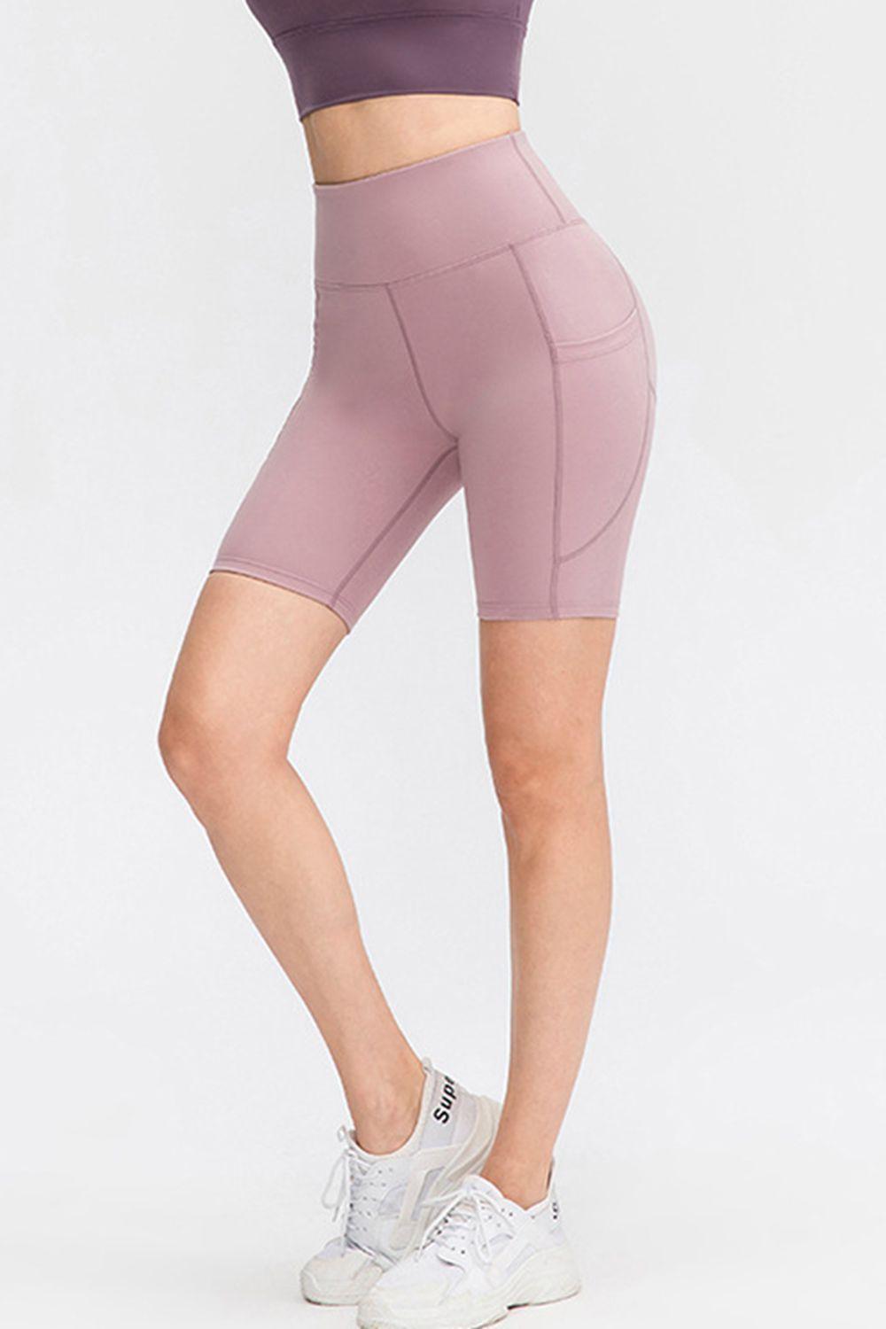 Short de sport à taille large avec poches