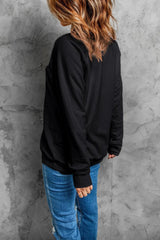 Sweat-shirt à manches longues et col rond avec motif tête de mort