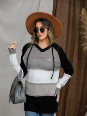 Pull à capuche à blocs de couleurs et œillets