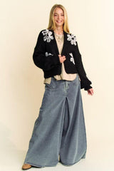 Cardigan ouvert à épaules tombantes avec appliques florales de Davi &amp; Dani