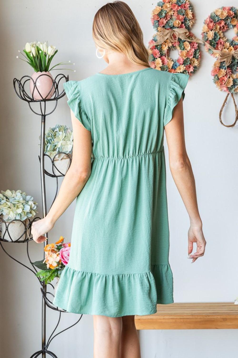 Robe Heimish à manches courtes, col en V, ourlet à volants