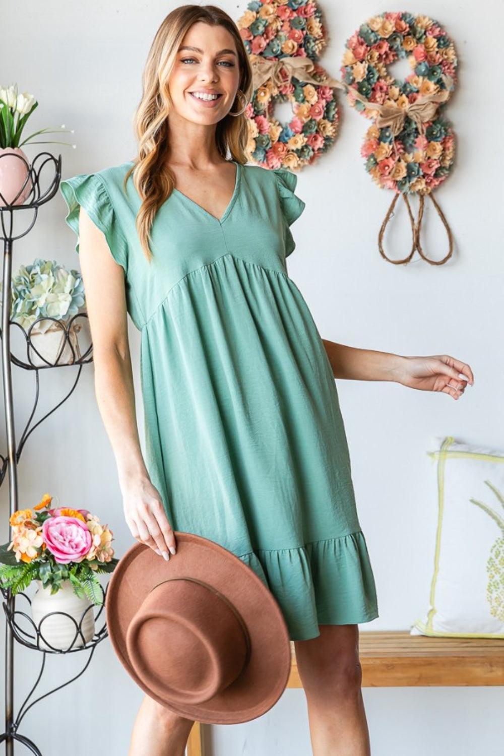 Robe Heimish à manches courtes, col en V, ourlet à volants