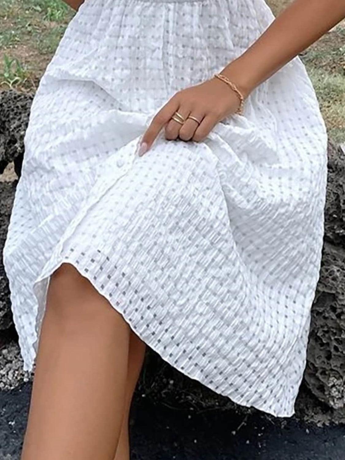 Robe à manches courtes avec surplis texturé