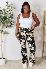Pantalon évasé taille haute à imprimé floral Heimish
