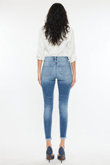 Jean skinny taille haute effiloché Kancan à la cheville