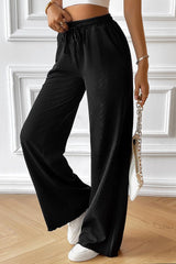 Pantalon à jambe large avec cordon de serrage et poches